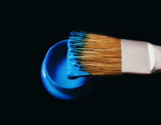 a blue pot of paint