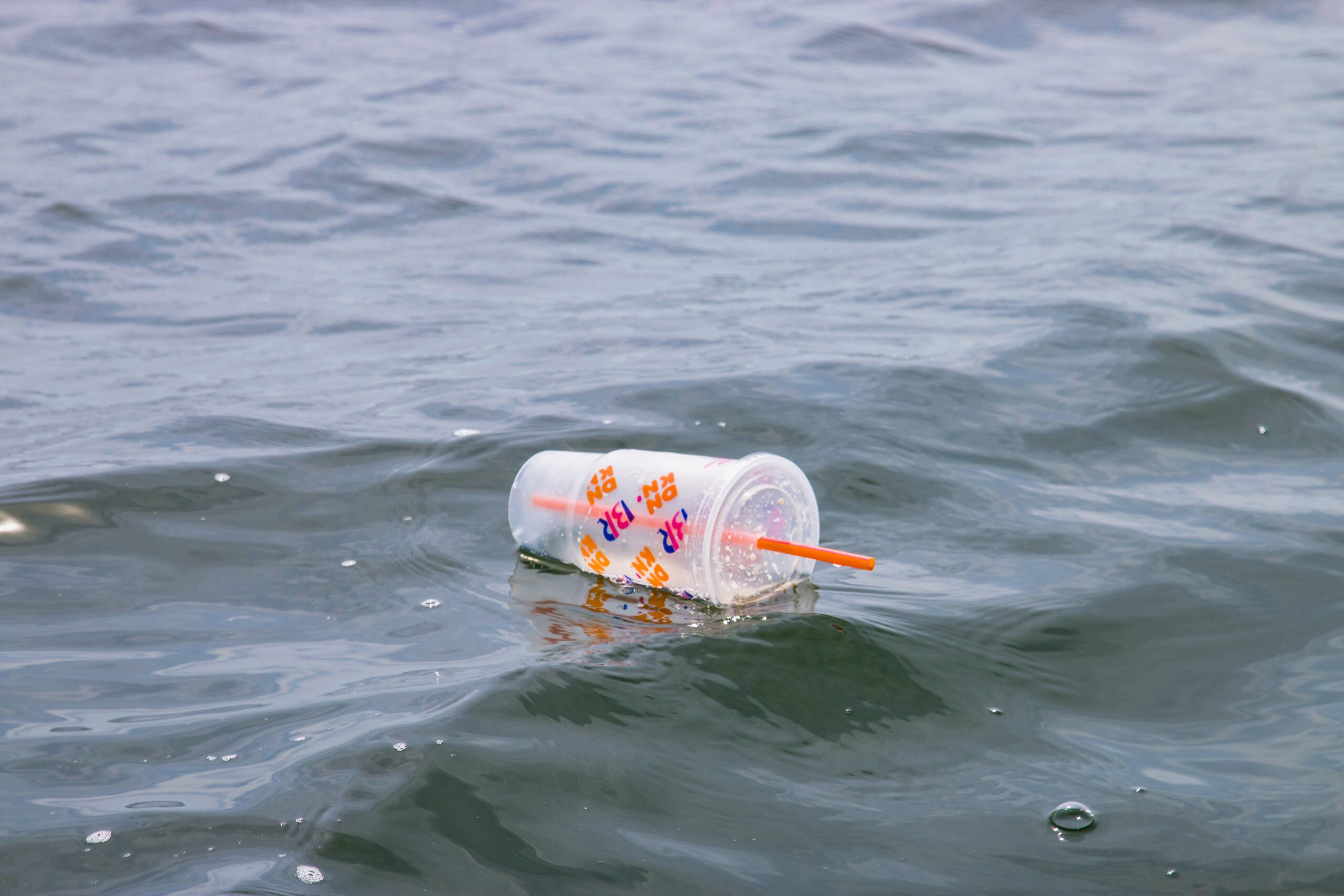 Plastic cup in water